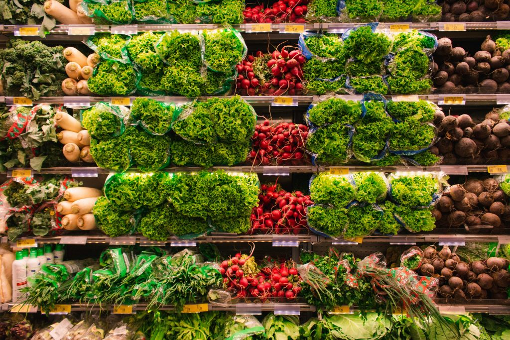 pexels-photo-2733918-2733918 Colorful assortment of fresh vegetables arranged on supermarket shelves, perfect for healthy eating themes.